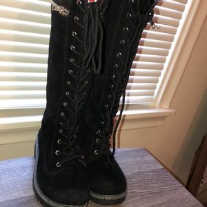Tall black boots